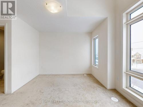Primary Bedroom - 64 Emmas Way, Whitby, ON - Indoor Photo Showing Other Room