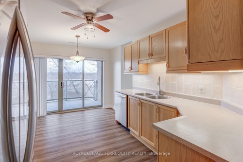 212-2085 Amherst Heights Drive, Burlington, ON - Indoor Photo Showing Kitchen With Double Sink