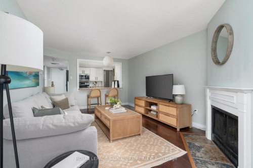 903-725 King Street W, Toronto, ON - Indoor Photo Showing Living Room With Fireplace