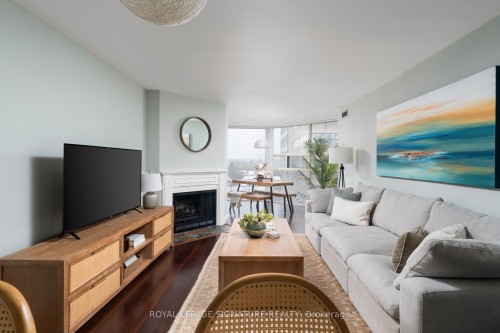 903-725 King Street W, Toronto, ON - Indoor Photo Showing Living Room With Fireplace