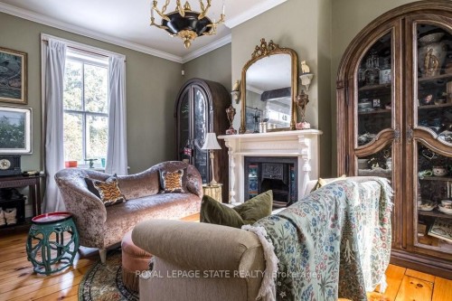 42 Melville Street, Hamilton, ON - Indoor Photo Showing Living Room With Fireplace