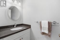 Main Floor Powder Room with Quartz Counter - 