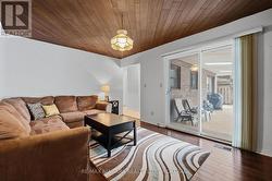 Family Room with Fireplace and Patio Doors - 