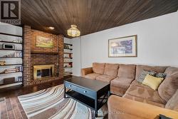 Family Room with Fireplace and Patio Doors - 