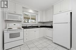 Light and Bright Eat In Kitchen - 