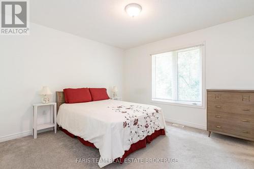 21 Forest Hill Drive, Springwater, ON - Indoor Photo Showing Bedroom