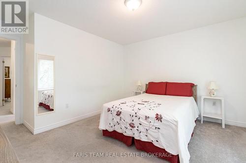21 Forest Hill Drive, Springwater, ON - Indoor Photo Showing Bedroom