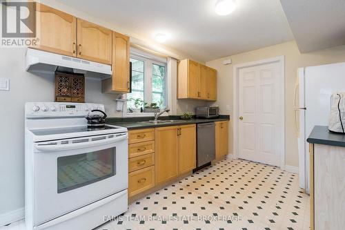 21 Forest Hill Drive, Springwater, ON - Indoor Photo Showing Kitchen With Double Sink
