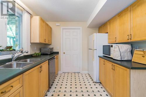 21 Forest Hill Drive, Springwater, ON - Indoor Photo Showing Kitchen With Double Sink