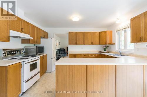 21 Forest Hill Drive, Springwater, ON - Indoor Photo Showing Kitchen With Double Sink
