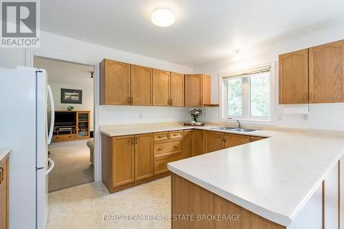 21 Forest Hill Drive, Springwater, ON - Indoor Photo Showing Kitchen With Double Sink