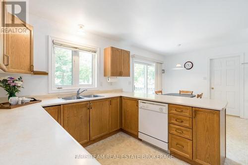 21 Forest Hill Drive, Springwater, ON - Indoor Photo Showing Kitchen With Double Sink