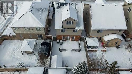 Fully fenced private yard with deck and shed - 26 Helena Feasby Street, Kitchener, ON - 