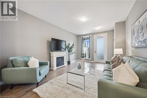 261 Woodbine Avenue Unit# 35, Kitchener, ON - Indoor Photo Showing Living Room With Fireplace