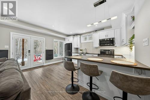 Open concept basement living/kitchen - 22 Rooke Court, Guelph (Willow West/Sugarbush/West Acres), ON 