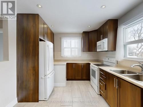 Main Floor Kitchen - 79 Cartier Crescent, Richmond Hill, ON - Indoor Photo Showing Kitchen With Double Sink