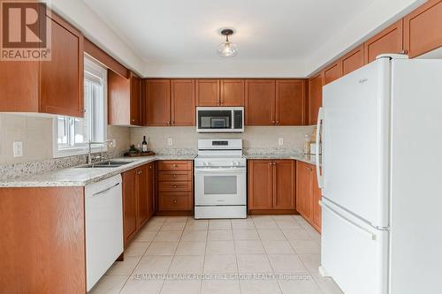 39 Mike Hart Drive, Essa, ON - Indoor Photo Showing Kitchen With Double Sink