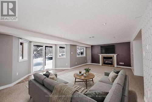 81 Sproule Drive, Barrie, ON - Indoor Photo Showing Living Room With Fireplace