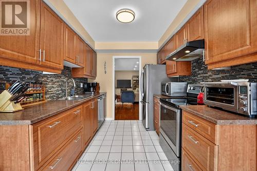 54 - 2550 Thomas Street, Mississauga, ON - Indoor Photo Showing Kitchen With Double Sink