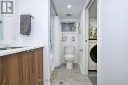 renovated bathroom Reno'd laundry - 