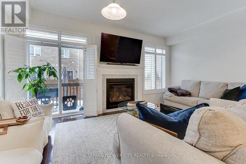 101 Huguenot Road, Oakville, ON - Indoor Photo Showing Living Room With Fireplace