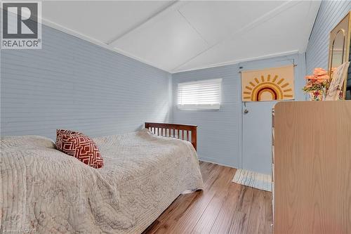 bedroom with door to side yard can hold queen bed - 17 Maple Lane, Rainham, ON - Indoor Photo Showing Bedroom