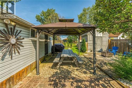 side yard with gazebo and covered eating area - 17 Maple Lane, Rainham, ON - Outdoor