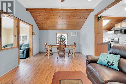 vaulted ciling with pine tongue and grove ceilings paneling - 17 Maple Lane, Rainham, ON - Indoor Photo Showing Living Room