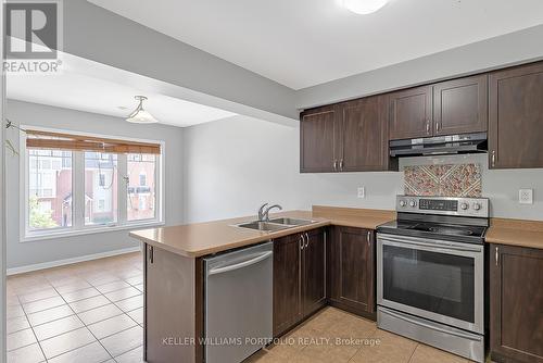 32 Affleck Road, Brampton, ON - Indoor Photo Showing Kitchen With Double Sink