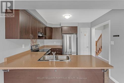 32 Affleck Road, Brampton, ON - Indoor Photo Showing Kitchen With Double Sink
