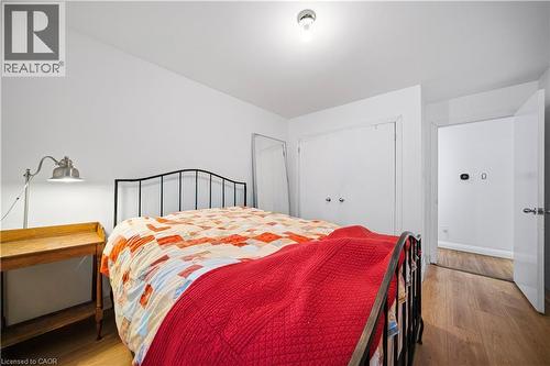 Bedroom featuring light wood-style flooring and a closet - 276 Lakeshore Road W, Oakville, ON - Indoor Photo Showing Bedroom