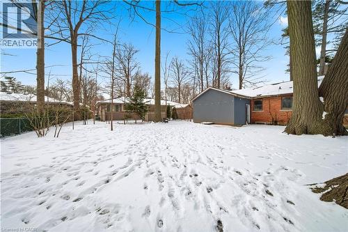 View of yard layered in snow - 276 Lakeshore Road W, Oakville, ON - Outdoor