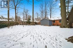 View of yard layered in snow - 