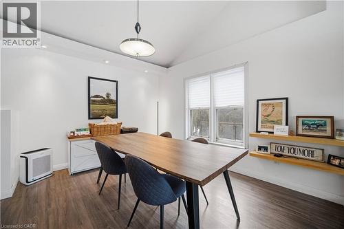 Dining area featuring lofted ceiling, dark wood finished floors, and recessed lighting - 276 Lakeshore Road W, Oakville, ON - Indoor Photo Showing Dining Room