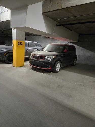 Garage - 610-1431 Av. De La Gare, Mascouche, QC - Indoor Photo Showing Garage
