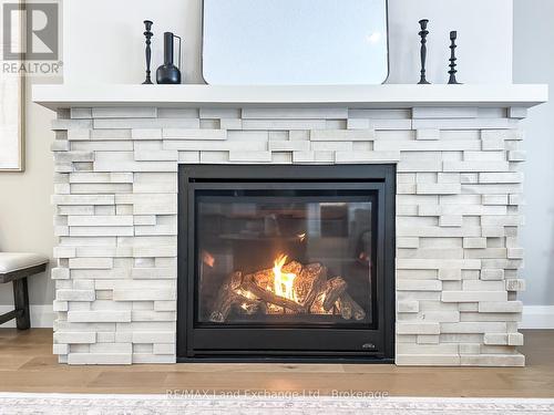920 Bogdanovic Way, Huron-Kinloss, ON - Indoor Photo Showing Living Room With Fireplace
