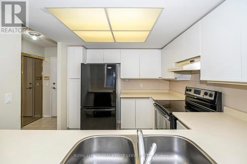 1201E - 325 Webb Drive, Mississauga, ON - Indoor Photo Showing Kitchen With Double Sink