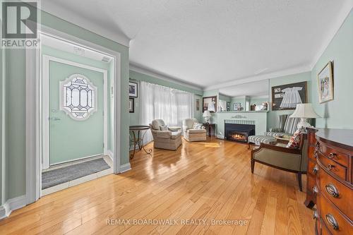 Entrance/Living Room - 961 Kingsmere Avenue, Ottawa, ON - Indoor Photo Showing Living Room With Fireplace