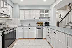 Spacious Kitchen Equipped with S/S Appliances - 