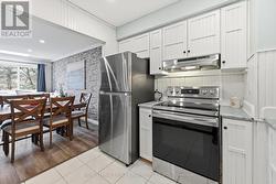 Spacious Kitchen Equipped with S/S Appliances - 