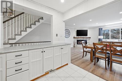 The Kitchen Offers an Abundance of White Cabinetry - 51 - 26 Moss Boulevard, Hamilton, ON - Indoor Photo Showing Other Room