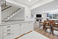 The Kitchen Offers an Abundance of White Cabinetry - 