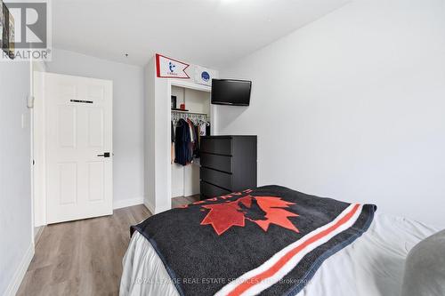 Second Bedroom Offers Brand New Laminate Flooring - 51 - 26 Moss Boulevard, Hamilton, ON - Indoor Photo Showing Bedroom