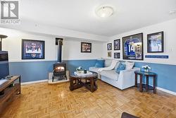 Generous Family Room Featuring a Cozy Gas Stove - 