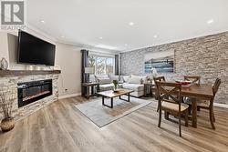 Living Room with Electric Fireplace & Feature Wall - 