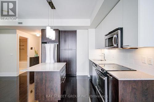 212 - 70 Roehampton Avenue, Toronto, ON - Indoor Photo Showing Kitchen With Upgraded Kitchen