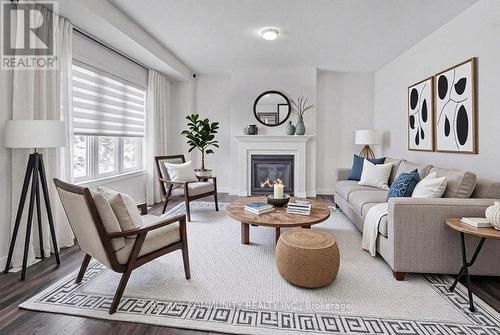 55 Tulip Crescent, Norfolk, ON - Indoor Photo Showing Living Room With Fireplace