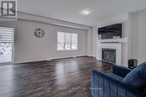 55 Tulip Crescent, Norfolk, ON - Indoor Photo Showing Living Room With Fireplace