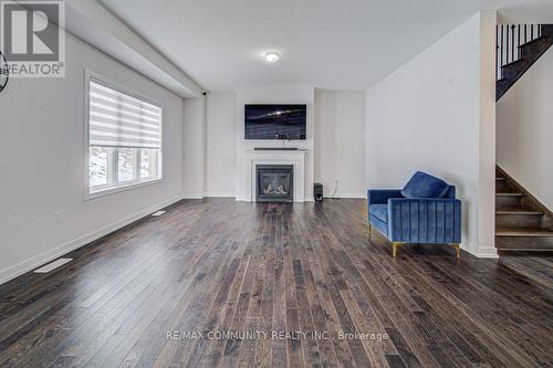 55 Tulip Crescent, Norfolk, ON - Indoor Photo Showing Living Room With Fireplace