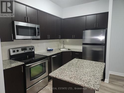 301 - 15 Bruyeres Mews, Toronto, ON - Indoor Photo Showing Kitchen With Upgraded Kitchen